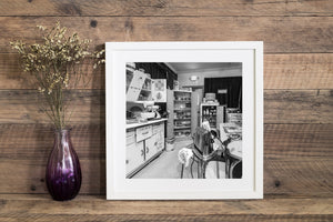 Americana kitchen interior with old cookware and patterned cupboards