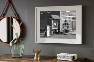 Retro storefront with Esso gas pump and wooden facade
