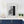 Reykjavik wall mounted mailbox with layered graffiti tags and decals