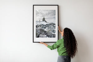 Dramatic Antarctica sky and rocky coast artwork