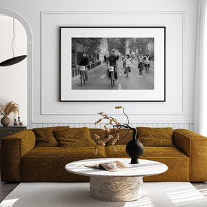 urban bicycle race with riders approaching camera black and white