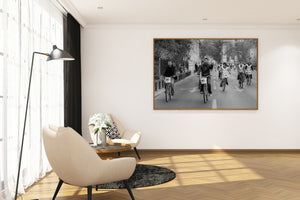 candid city cycling event with expressive rider black and white