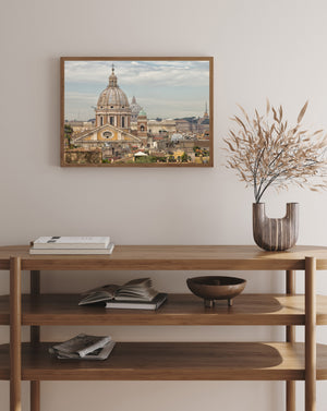 Weathered church domes and terracotta roofs across Rome
