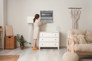 Vintage advertising mural photographed in black and white