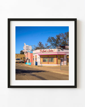 DeSoto’s Salon on Route 66 with a classic car on the roof