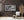 Wood cabinet display with vintage Americana artifacts