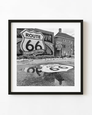 Route 66 mural reflected in a puddle in Pontiac, Illinois