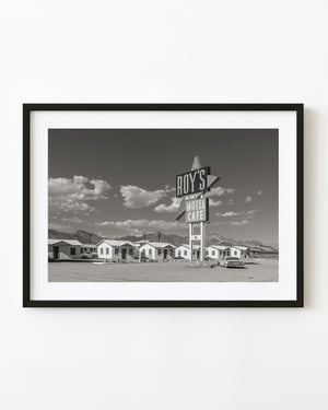 Roy’s Motel Café sign above desert cabins in Amboy, California