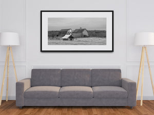 Weathered barns and an open-sided shelter overlooking a Maine pasture