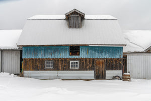 Blue Ontario Barn Beneath a Snow Covered Roof Winter Wall Art
