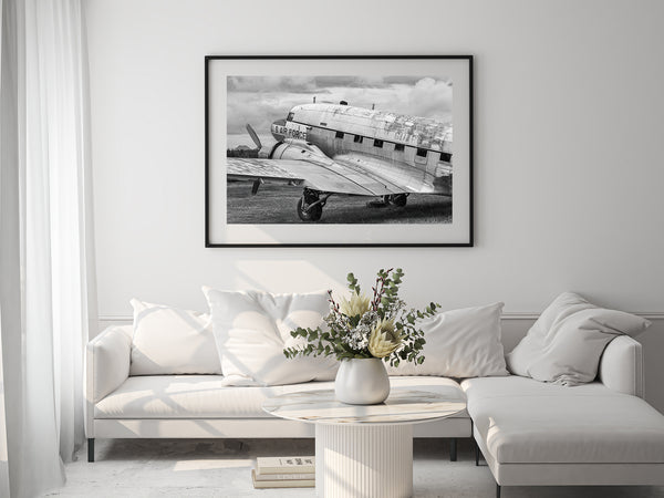 Black-and-white photo of old U.S. Air Force plane, peeling paint and aged metal