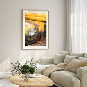 Faded yellow truck front corner photo