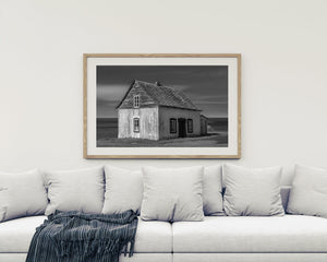 Weathered wooden house artwork in monochrome
