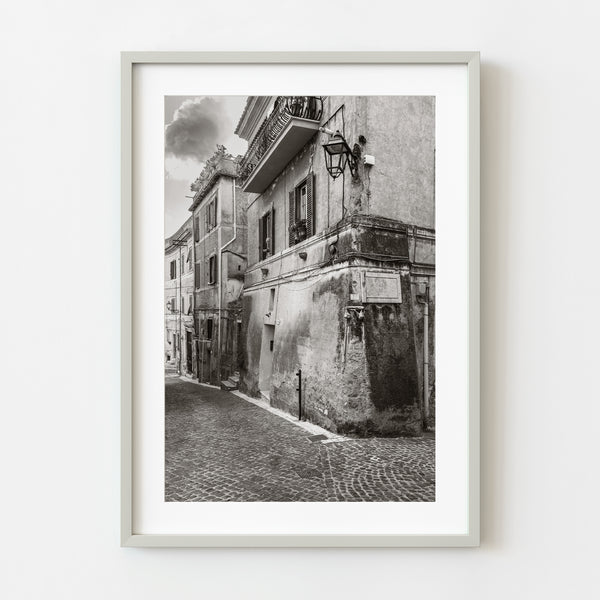 Rustic Italian building on cobblestone street wall art