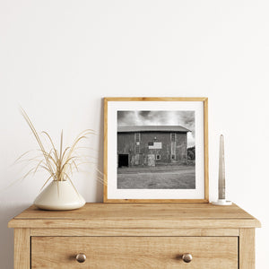 Historic farmhouse with flag showing rural American pride