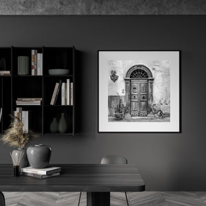 Black and white photo of historic door