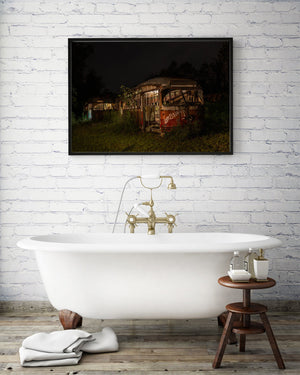 Real urban photography of derelict transit vehicles under city lights