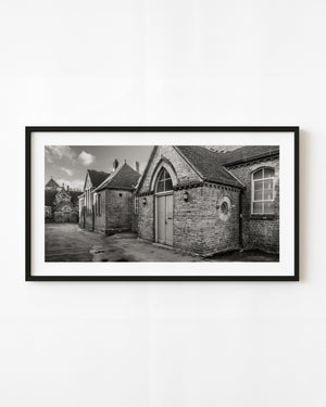 Historic brick courtyard in Rye photographed in black and white