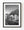 Historic Rye street and steep tiled roof in black and white