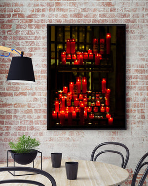 Candlelit devotional display with rich red and golden tones