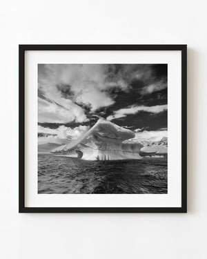 Sculpted Antarctic iceberg in black and white