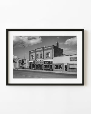 Shaunavon Plaza Theatre and main street in black and white