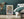 Dense Tokyo street-art layers forming an abstract colour pattern