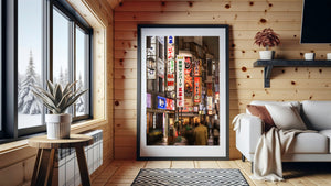 Motion-blurred walkers beneath bright Shinjuku restaurant lights