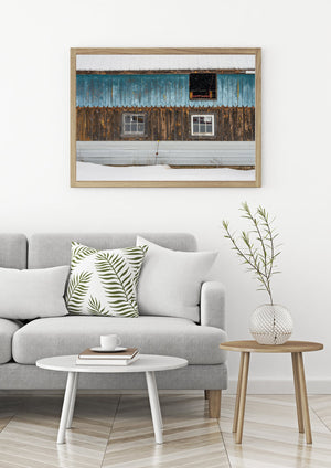 weathered barn windows in snowy Ontario