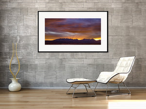 Golden evening light along a rugged Sierra Mountains ridge.