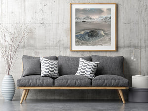 Quiet Lofoten seascape with pale mountains and wet sand