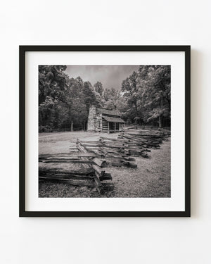 Smoky Mountains log cabin in a black and white landscape