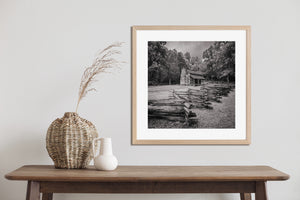 Historic-looking log house in a Smoky Mountains landscape