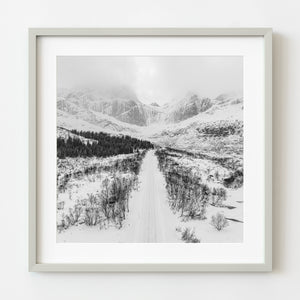 Snow-covered road in Norway black and white