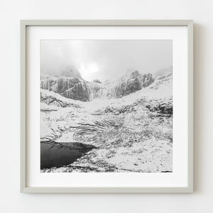 Snowy mountains and lake in Norway black and white