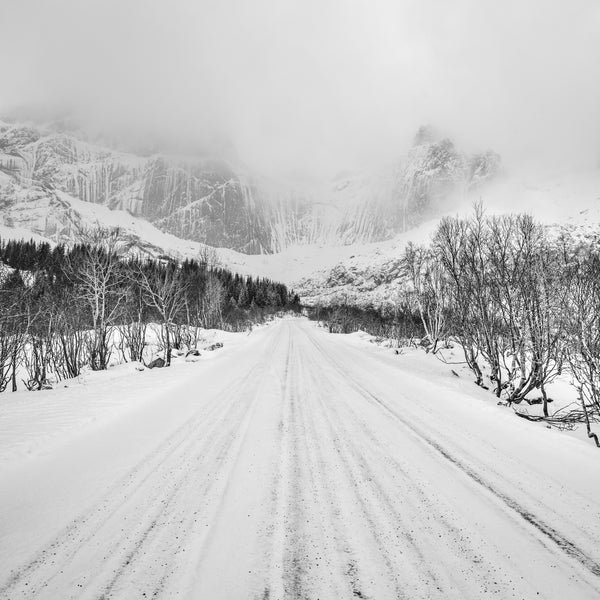 Black and white winter road in Norway