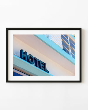 South Beach hotel sign on pastel architecture