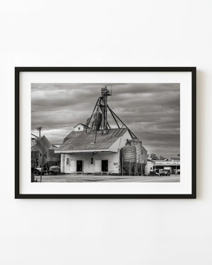 South Whitley grain elevator beneath heavy clouds
