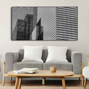 Skyscraper reflections on glass building façade