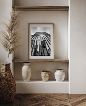 architectural reflection image showing layered city towers