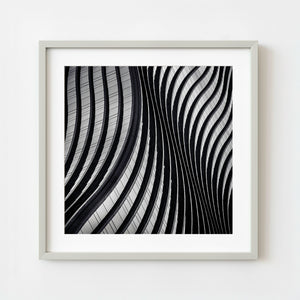 Monochrome abstract curves on Seoul Garak Tower East façade