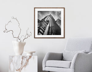 Modern skyscraper façade with vertical lines in monochrome