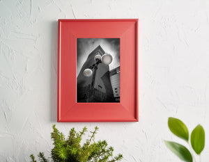 Modern Korean building with geometric lines and cloudy sky