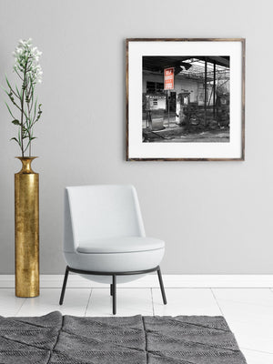 Real roadside photography showing rural gas station in decline