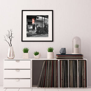 Urban decay photo of empty Southern gas station in warm light