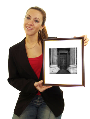 Monochrome study of a cathedral entrance with monumental columns.