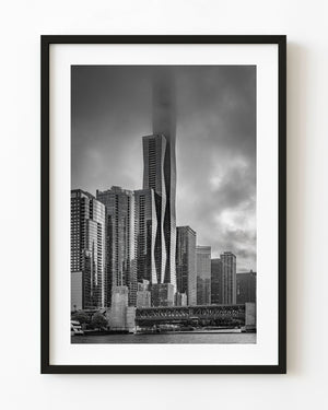St Regis Chicago skyscraper disappearing into fog above the river in black and white.