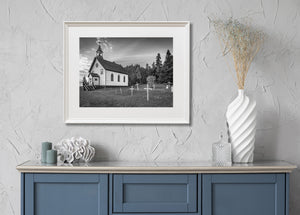Monochrome rural Ontario scene with a chapel, bell tower and cemetery.