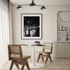 Authentic New York photography showing rain-slicked streets and neon glow