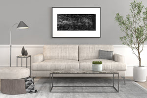 White chalk graffiti fills black panels in this panoramic Sydney street photograph.